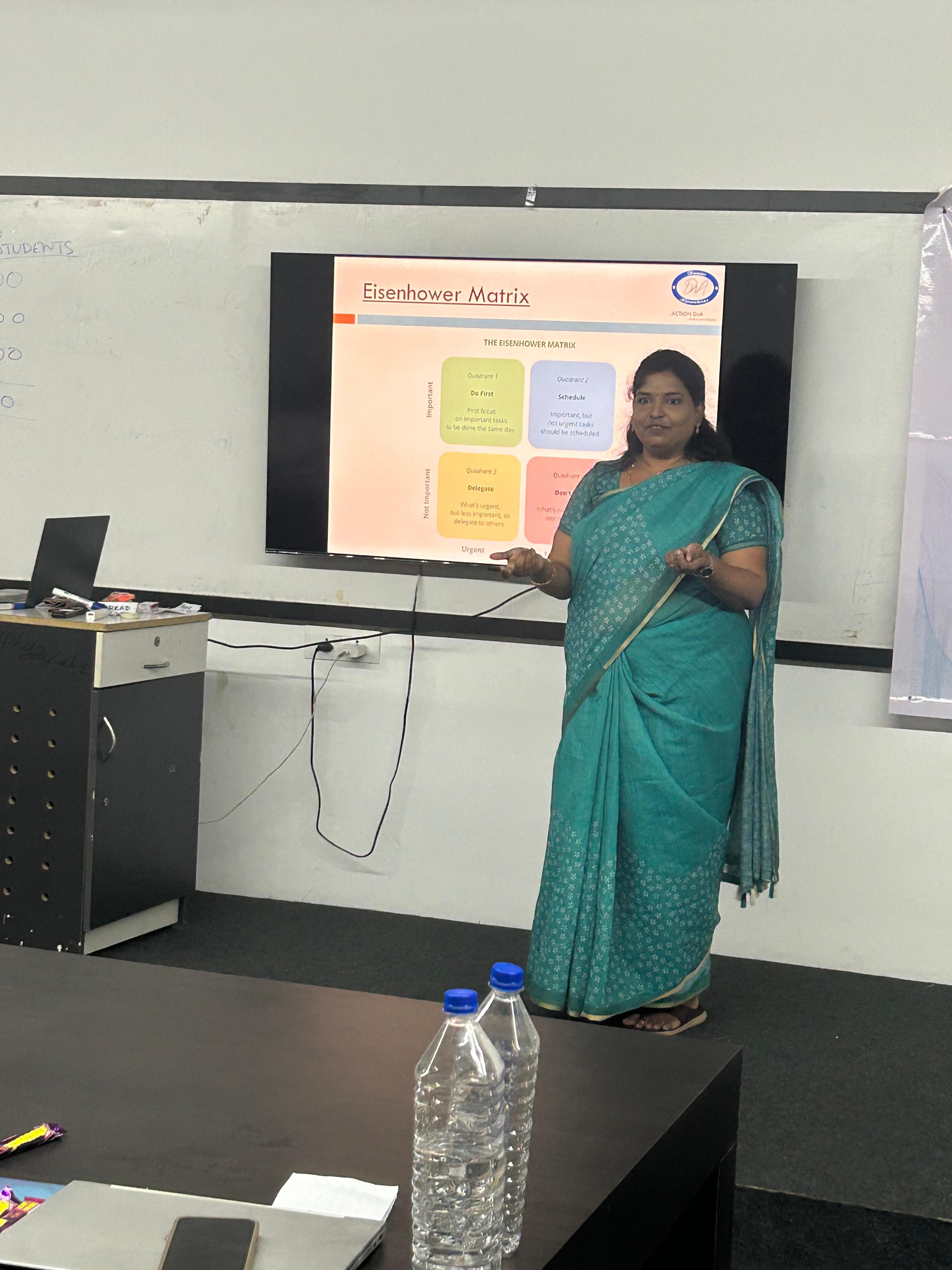 Trainer presenting the Eisenhower Matrix during a corporate time-management session